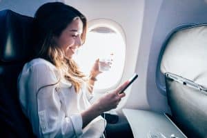 plane passenger with phone