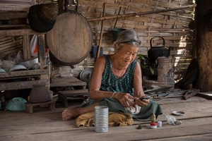 woman on cell phone in remote indonesia