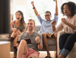 people excited to be watching tv